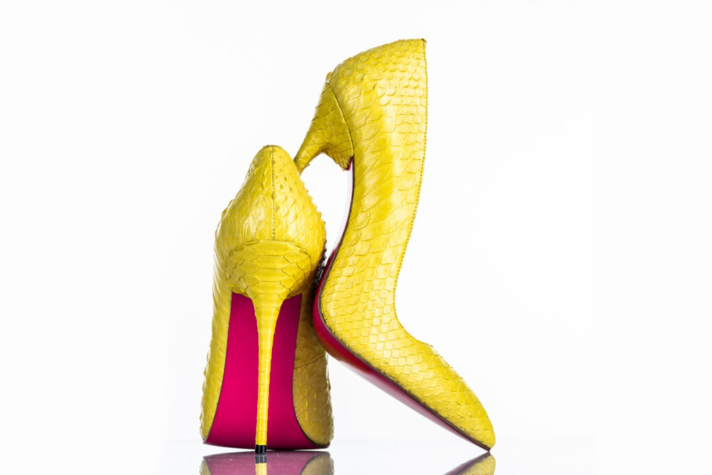 fashionable-woman-s-high-heel-shoe-isolated-white-background-beautiful-yellow-female-high-heels-shoe-luxury-rear-view edit