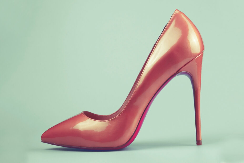 female-pink-shoes-blue-surface edit